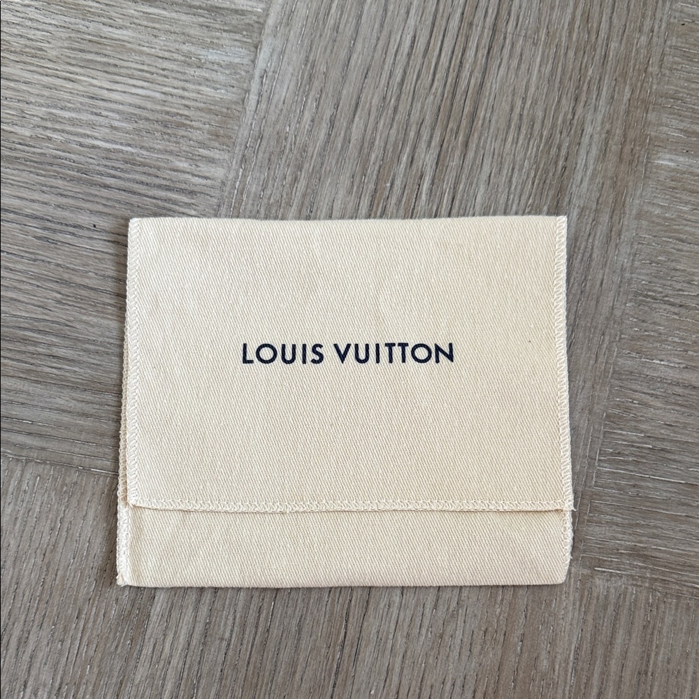 Louis Vuitton Cream Folded Pouch